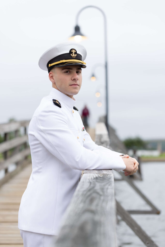 Navy officer portrait in white uniform.