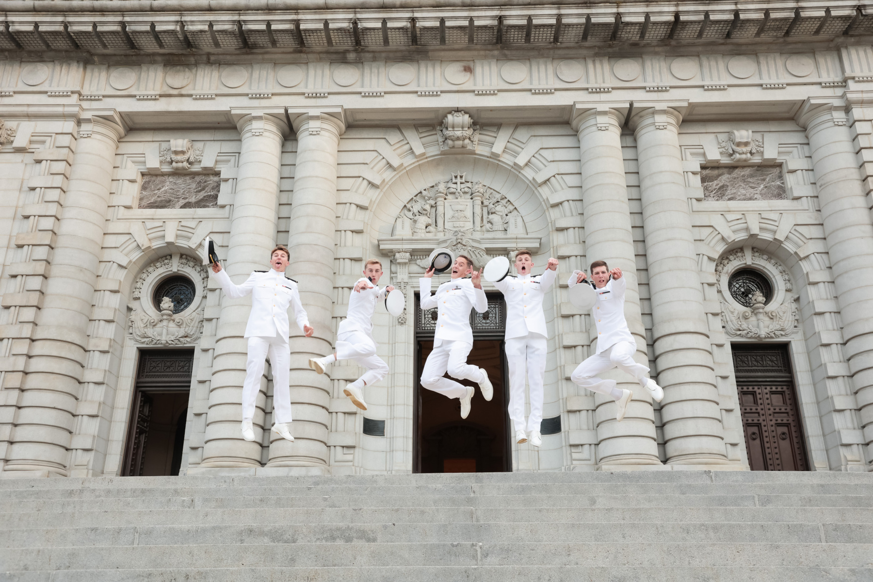 United States Naval Academy Midshipmen Jump in Group